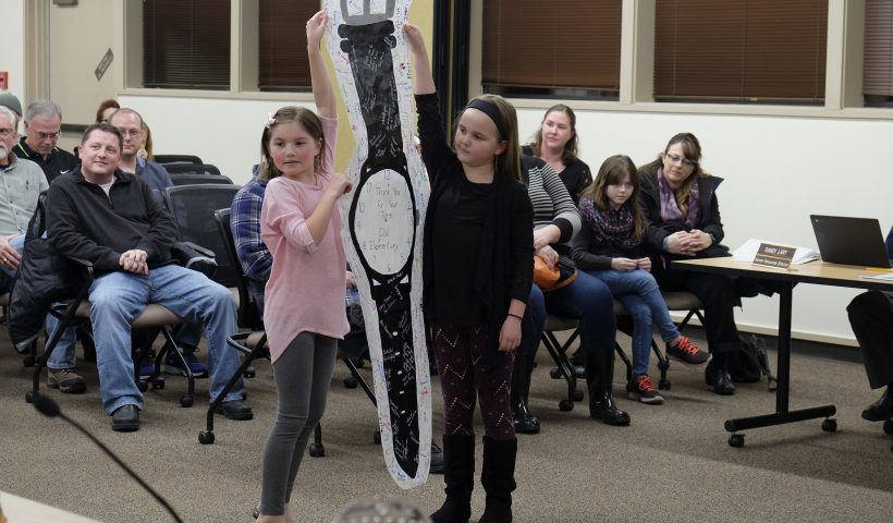 Kids with giant watch