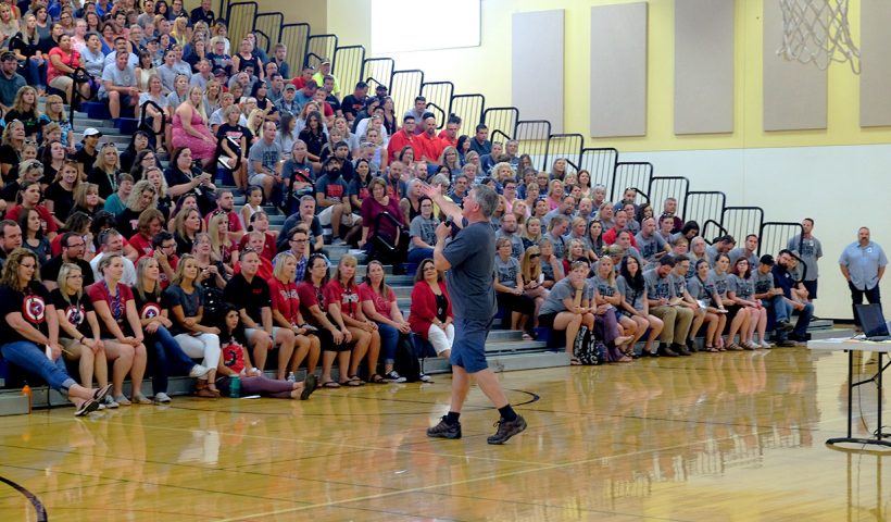 Superintendent Golden speaks to staff in Timber Ridge gym